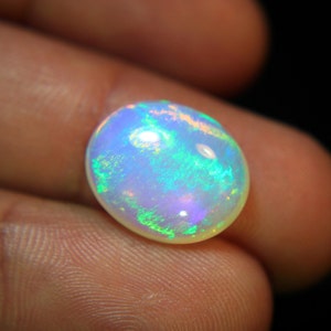 4.Ct Top Quality Natural Ethiopian Opal Oval Shape, A Gemstone for the Fiery, Sparkling and Unique Opal with Fire and Rainbows image 10