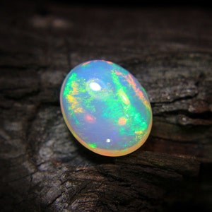 4.Ct Top Quality Natural Ethiopian Opal Oval Shape, A Gemstone for the Fiery, Sparkling and Unique Opal with Fire and Rainbows image 7