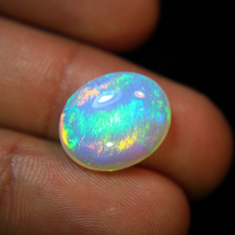 4.Ct Top Quality Natural Ethiopian Opal Oval Shape, A Gemstone for the Fiery, Sparkling and Unique Opal with Fire and Rainbows image 2