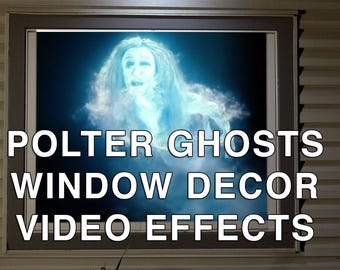 May include: A window display featuring a ghostly figure with long hair and a blue glow. The text "POLTER GHOSTS WINDOW DECOR VIDEO EFFECTS" is displayed in white letters. The window is framed by a dark gray border.