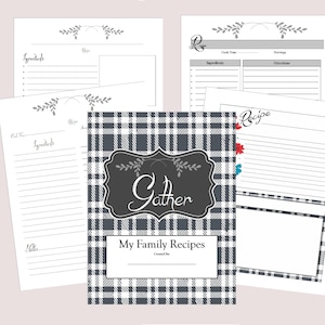 May include: A black and white plaid recipe book with the title "Gather My Family Recipes". The cover features a black and white plaid pattern with a gray banner that says "Gather" in a script font. The book is surrounded by blank recipe pages with lines for ingredients, directions, and notes.