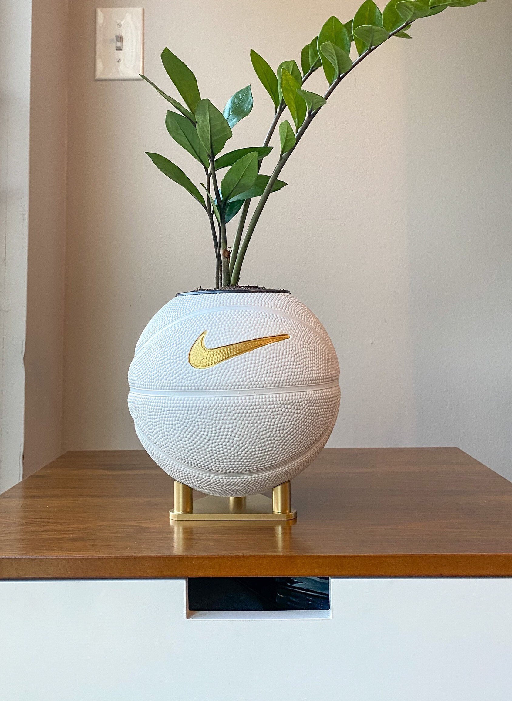 This NYC Artist Makes Louis Vuitton Vases, Nike Planters & More