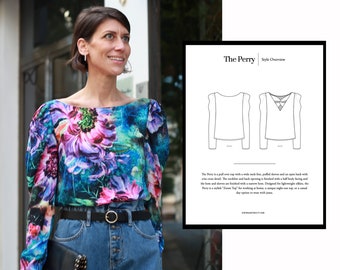May include: A floral print blouse with a wide neckline, puffed sleeves, and an open back. The blouse is styled with a black belt and blue jeans. The text "The Perry Style Overview" is visible in the image.