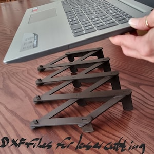 Soporte expandible para rejilla de ventilación de ordenador portátil. Archivo digital solo para corte por láser.