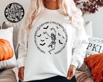May include: White sweatshirt with a black skeleton dancing in a circle with the text "Everyday is Halloween" repeated around the skeleton.