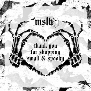 May include: Black and white illustration of two skeletal hands forming a heart shape with the text "thank you for shopping small & spooky" in the center. The background is a white and gray grunge pattern with bats.