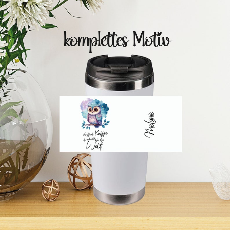 May include: White travel mug featuring a colourful owl design and the text "Every cup of coffee smells like the world" and the name "Melanie".