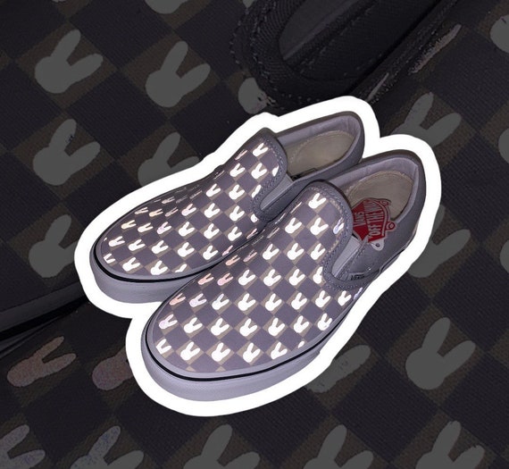 vans checkerboard slip on reflective
