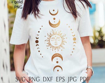 May include: White t-shirt featuring a gold celestial design. The design includes a sun with a face, crescent moons, and phases of the moon. The shirt also has the text "SVG PNG DXF EPS JPG PDF".