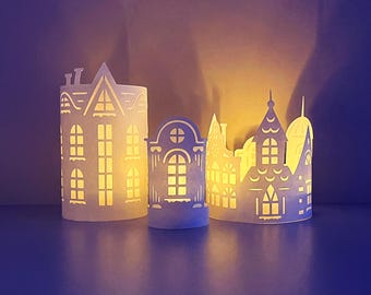 Modelo SVG de lanternas em formato de casinhas de Natal, vila natalina em SVG, conjunto de castiçais de papel, arquivo de corte para projetos Cricut.