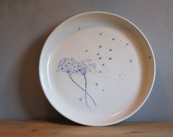 hand painted and handtrown large plate/bowl ,creme slip and cobald flowers