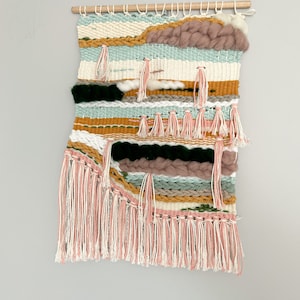 Light color weaving. Boho Wall Hanging, Woven Tapestry Art. Braided weaving cloud