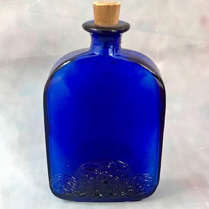 Vintage cobalt blue bottle with stopper, decorative vintage blue glass bottle