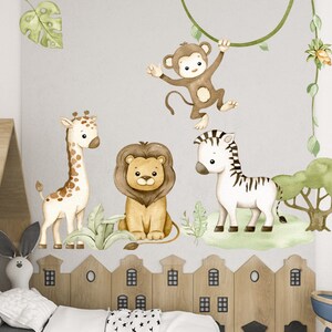 May include: A set of five watercolor animal wall decals featuring a giraffe, lion, zebra, monkey, and a leafy tree. The decals are perfect for a nursery or child's room.