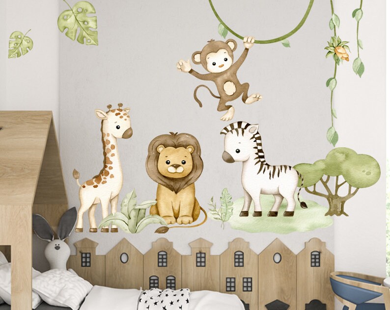 May include: A set of five watercolor animal wall decals featuring a giraffe, lion, zebra, monkey, and a leafy tree. The decals are perfect for a nursery or child's room.