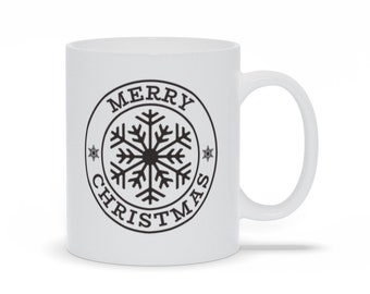 Taza de café con copos de nieve de Feliz Navidad