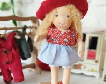 10'' inch handmade Waldorf doll. Comes with 2 different outfits and a carrying bag. Ecofriendly natural cloth doll.Playmate baby doll.