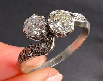 Antique Platinum, 1920s Diamond Toi et Moi Crossover Engagement Ring