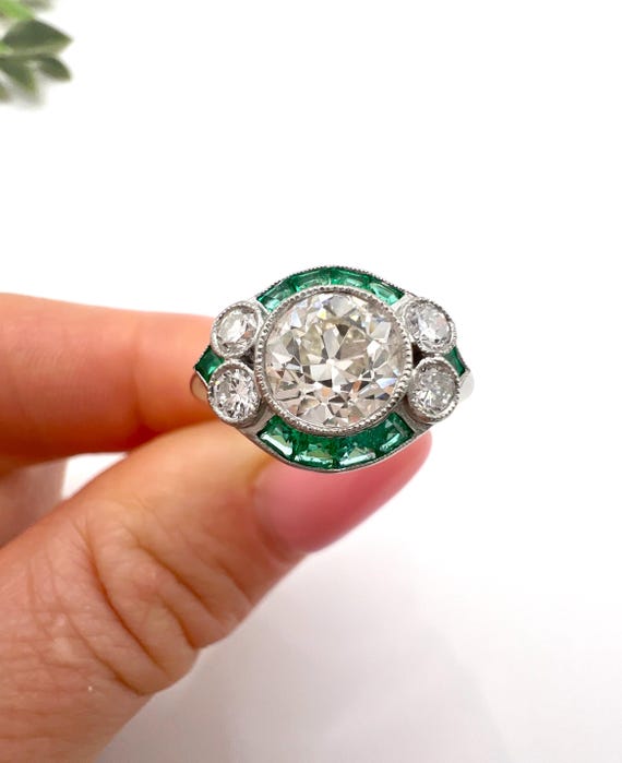 Platinum, Art Deco Style Calibrated Emerald & Diamond Ring