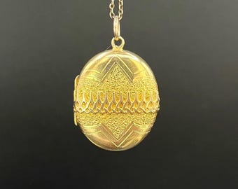 Antiek 15 kt geelgouden, ovaal medaillon met Victoriaans patroon