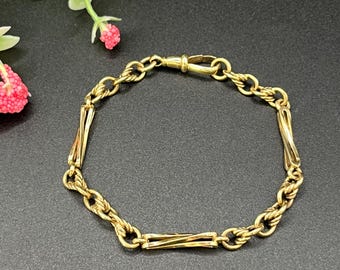 Bracelet ancien à maillons fantaisie édouardien estampé en or 9 carats, avec fermoir clip pivotant