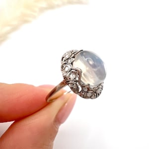 Antique Platinum, Edwardian era Cabochon Moonstone and Rose Cut Diamond Ring