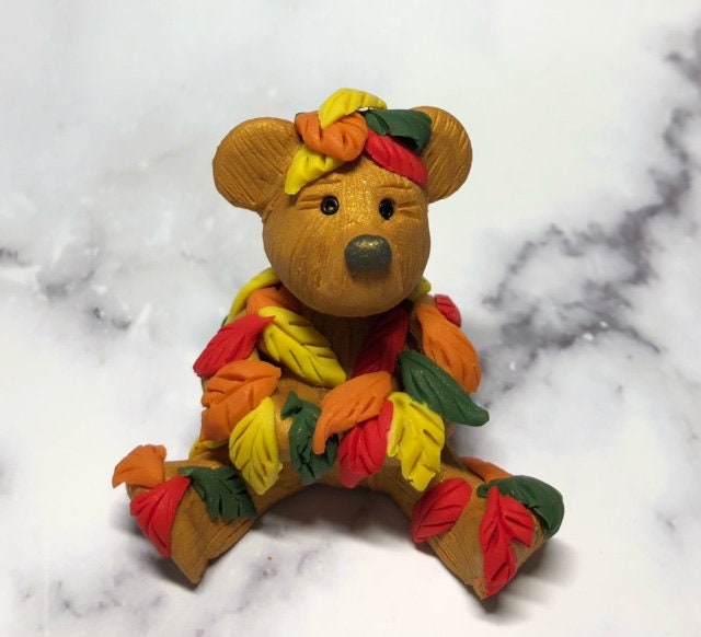 small FALL Teddy Bear Cub Holding Colorful Leaves