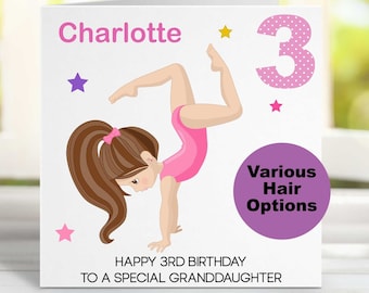 May include: A pink and white birthday card with a girl doing a handstand. The card says "Charlotte" and "Happy 3rd Birthday to a special granddaughter". There is a pink number 3 with white polka dots on the card. The card also has a purple circle with the text "Various Hair Options".