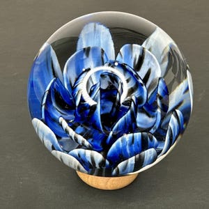 Contemporary Handmade Art Glass Marble 3.12" Blue Black White Flower Implosion