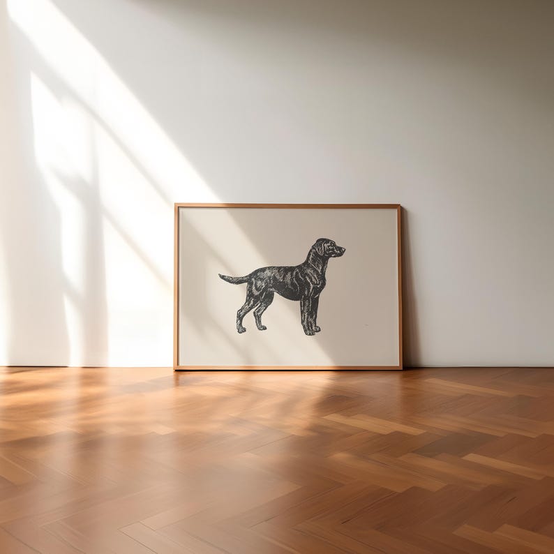 May include: A black and white illustration of a dog in a simple wooden frame. The dog is standing on a light beige background.