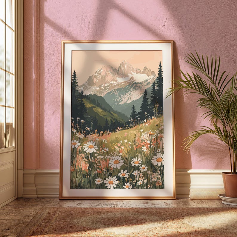 May include: A framed illustration of a mountain range with a field of white daisies in the foreground. The mountains are snow-capped and the sky is a soft pink.