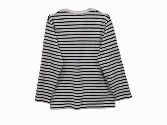 Uniqlo camisetas graficas hotsell