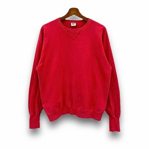 May include: A solid red sweatshirt with a crew neck and long sleeves. The sweatshirt is hanging on a wooden hanger against a white background. The cuffs and neckline are ribbed.