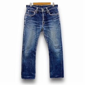 May include: A pair of blue denim jeans with a straight leg fit. The jeans have a classic five-pocket style and a button fly.