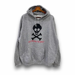 May include: Gray hooded sweatshirt with a black skull and crossbones graphic and the text "WE TRYING TO SAVE?" in red.