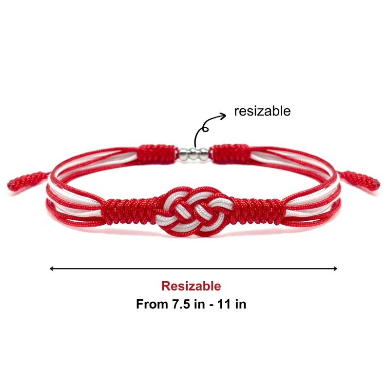 May include: Red and white braided bracelet with a silver slider to adjust the size. The bracelet is adjustable from 7.5 to 11 inches.  The bracelet features a knot design.