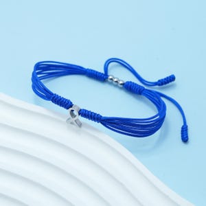 Concienciación sobre el lazo azul, cáncer de colon, cáncer colorrectal, concienciación sobre la artritis, pulsera solidaria, brazalete con lazo, cordón de surfista