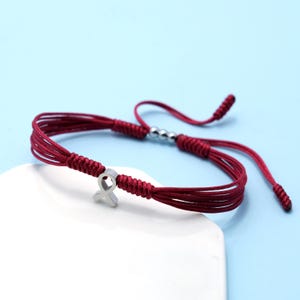 Burgundy Ribbon Awareness Bracelet for Multiple Myeloma, Brain Aneurysm, Disabled Adults, Factor V Leiden, Meningitis, String Bracelet