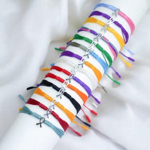 Anpassad färg, Medvetenhetssträngarmband, Armband för en god sak, Medvetenhetspusselbandarmband, Surfarsträng för män, kvinnor, barn