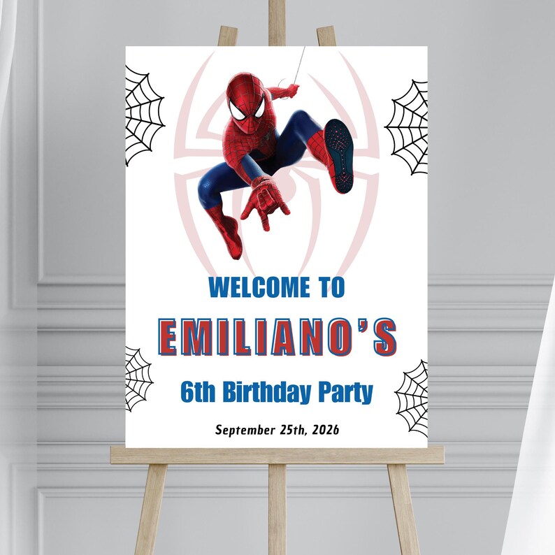 Op de afbeelding: Een wit bord op een ezel met Spider-Man en de tekst "WELCOME TO EMILIANO'S 6th Birthday Party September 25th, 2026". Het bord heeft een Spider-Man-logo en spinnenwebafbeeldingen.