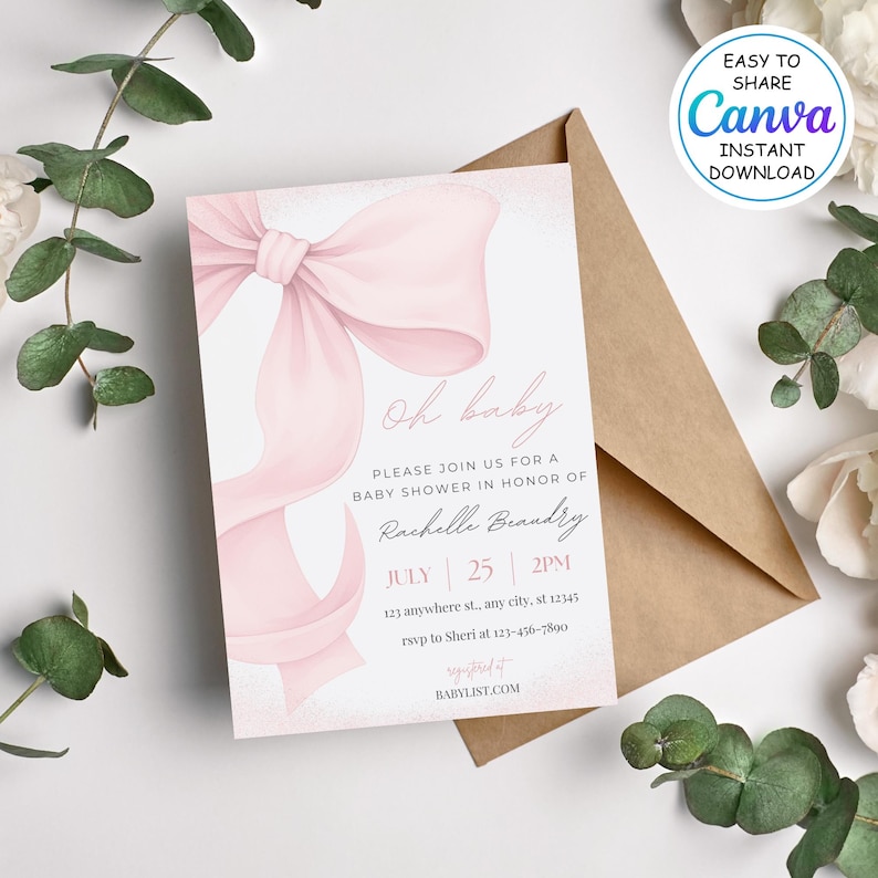 May include: A baby shower invitation with a large pink bow and the words "Oh baby." The invitation includes details for Rachelle Brandry's baby shower, date, time, and RSVP information. A brown envelope is behind the invitation.