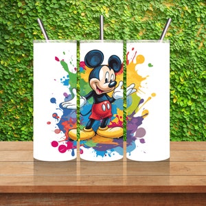May include: Three white tumblers with a colourful paint splatter design and a cartoon image of Mickey Mouse.