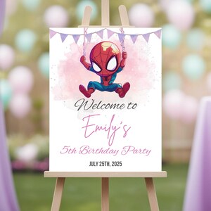 May include: A white sign on a wooden easel displays a cartoon Spider-Man swinging from a banner. The sign reads "Welcome to Emily's 5th Birthday Party" with the date July 25th, 2025. The background has a watercolour effect.