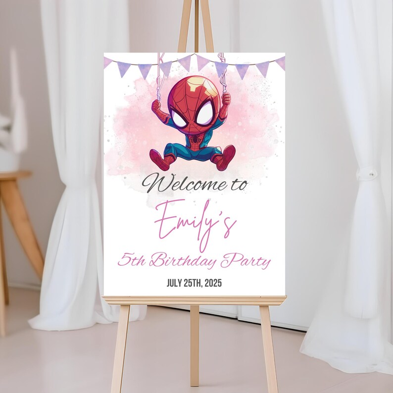 May include: A sign welcoming guests to Emily's 5th birthday party, with a cartoon Spider-Man swinging from a banner. The sign reads "Welcome to Emily's 5th Birthday Party" and the date "JULY 25TH, 2025". It is displayed on a wooden easel.