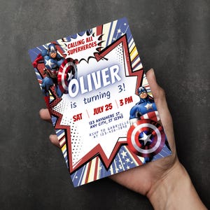 以下が含まれることがあります： キャプテン・アメリカをテーマにしたスーパーヒーローの誕生日パーティーの招待状。招待状は赤、白、青の配色で、「OLIVER is turning 3!」というテキストとイベントの詳細が記載されています。「CALLING ALL SUPERHEROES」というフレーズも含まれています。