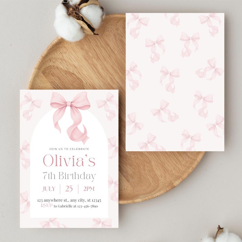 May include: A set of birthday invitations with a soft pink bow design. The invitation on the left features the text "Olivia's 7th Birthday" with date and time details. The matching card on the right has a repeating bow pattern.