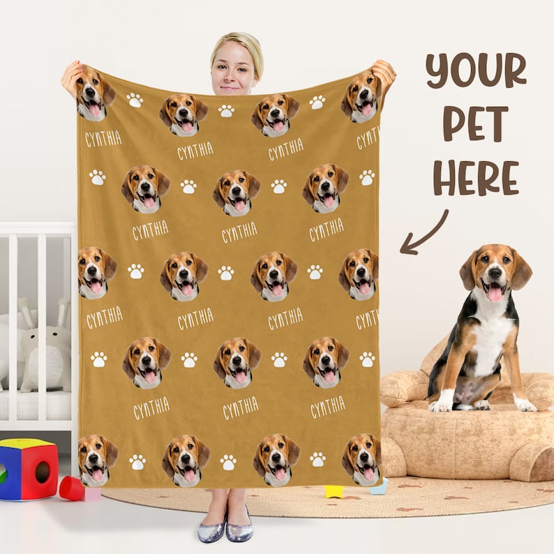 Woman holding a custom dog photo blanket next to a Beagle.