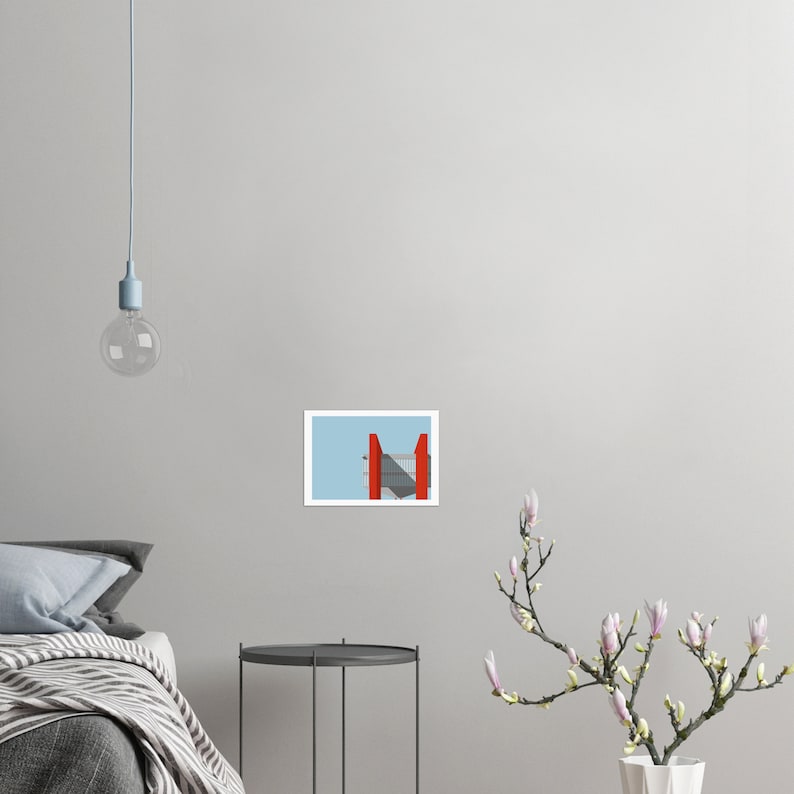 May include: A red and gray geometric structure against a light blue sky.