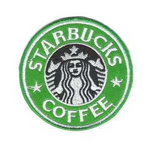 May include: Green and white embroidered patch with the Starbucks logo, featuring a mermaid with a crown and the words "Starbucks Coffee".