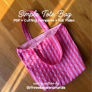 May include: A tote bag featuring vertical stripes in alternating shades of pink and light purple with two matching fabric handles. The text Simple Tote Bag PDF + Cutting Template + Full Video and sewing pattern by @threebearsnaturals is visible.